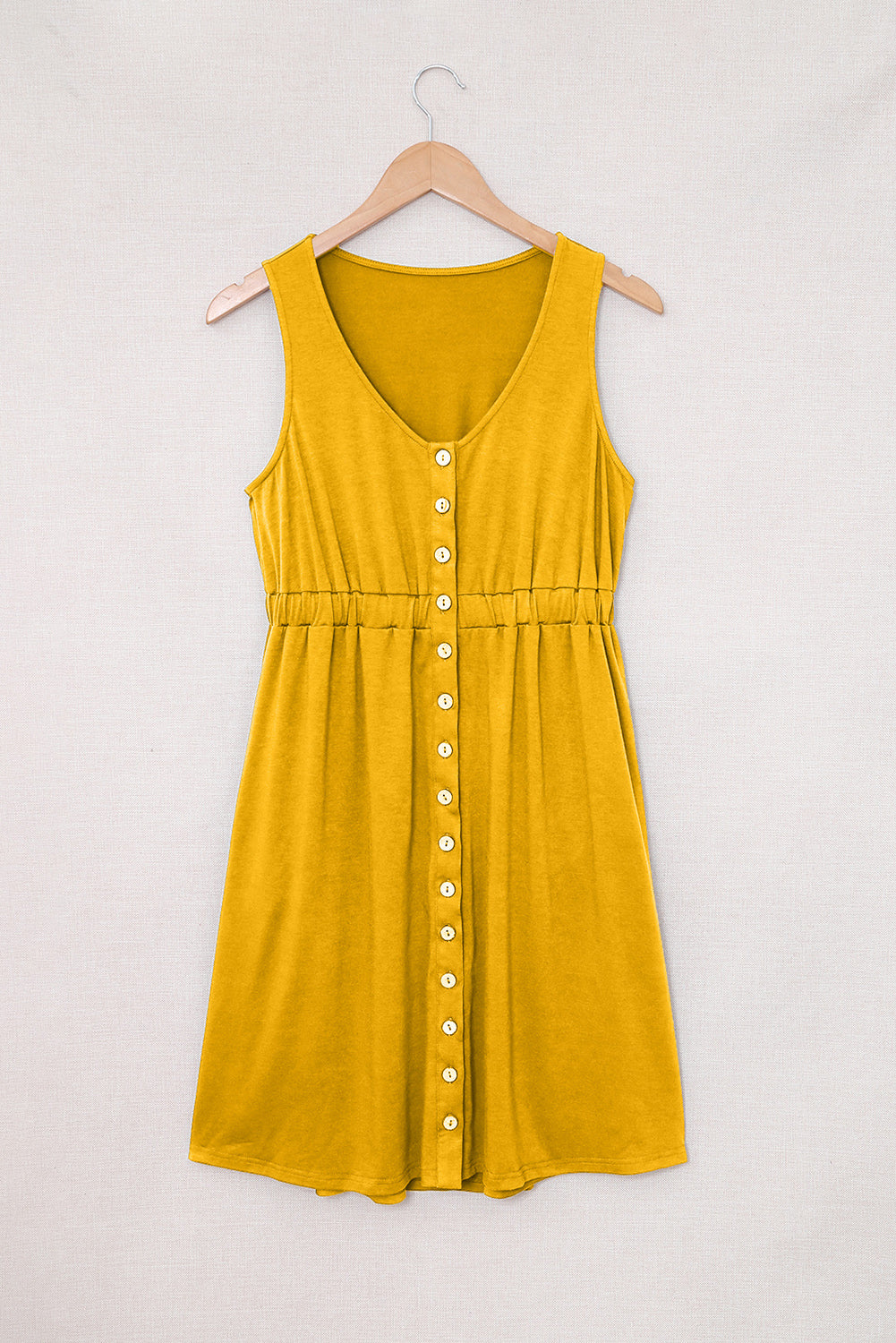 Mini vestido sin mangas con botones