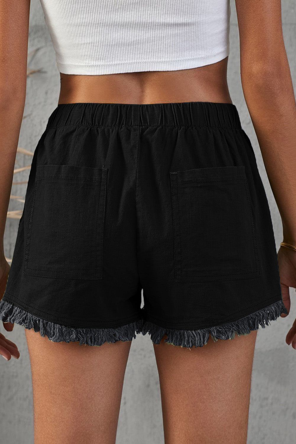 Short en jean effiloché avec poches