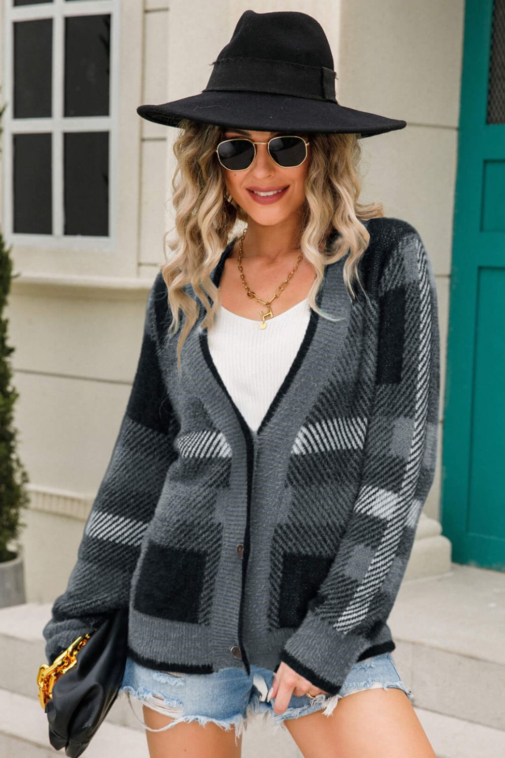 Cardigan pelucheux rayé boutonné à l'avant